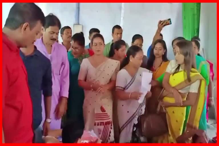 angurlata Deka distributes clothes among flood-affected women in Barpeta