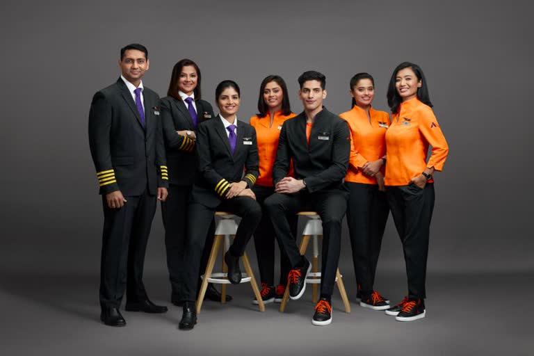 Rakesh Jhunjhunwala akasa air  Akasa Air first look of crew uniform  Akasa Air crew uniform  ആകാശ എയർ ക്രൂ യൂണിഫോം  രാകേഷ് ജുൻജുൻവാല ആകാശ എയർ  ആകാശ എയറിന്‍റെ ക്രൂ യൂണിഫോമിന്‍റെ ഫസ്റ്റ്ലുക്ക് പുറത്ത്