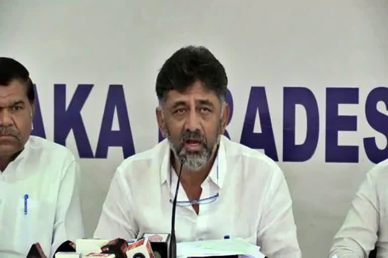 kpcc-president-dk-shivakumar-urges-to-resign-the-home-minister