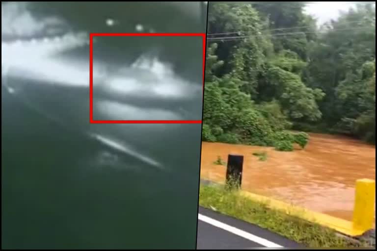 Car overturns into river