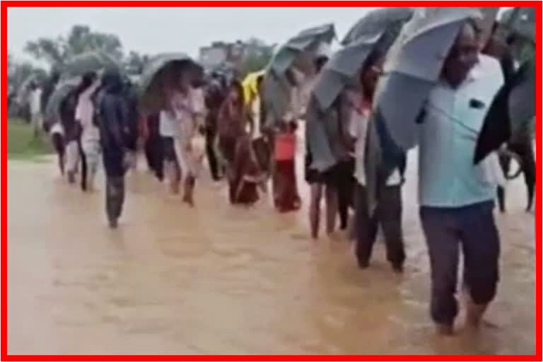 Graveyard at Shelgaon under water