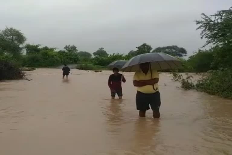 Goul Budruk village surrounded by flood