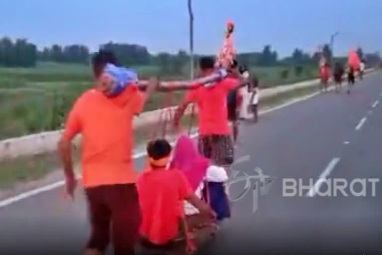 UP: Two brothers carry mother, specially-abled brother on shoulders for Kanwar Yatra