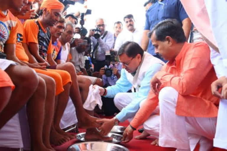 Uttarakhand CM Dhami welcomes Kanwariyas by washing their feet in Haridwar