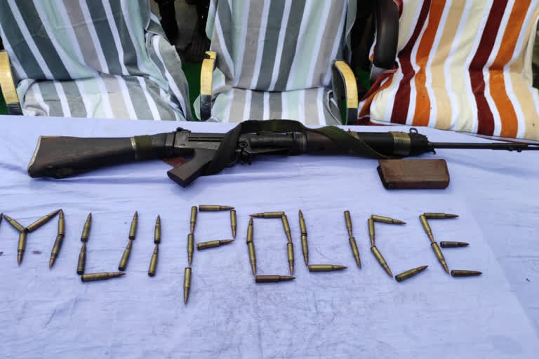 Seized arms and ammo on display