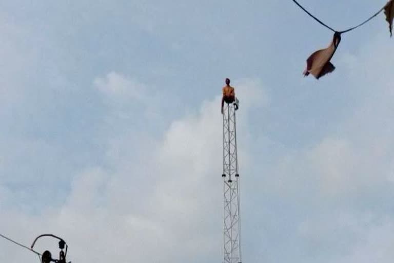 Mentally man climbing on tower in Bhopal