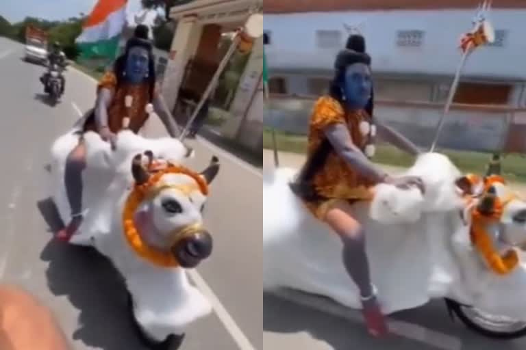 വൈറൽ വീഡിയൊ  lord shiva viral video  man on nandi  man dressed as lord shiva rides on bike  കൻവാർ യാത്ര  കൻവാർ യാത്രിലെ വൈറൽ വീഡിയൊ