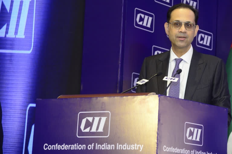 The Confederation of Indian Industry (CII) president Sanjiv Bajaj suggests the Central government to contemplate reducing the personal income tax rates to spur economic activities, while assuring that the country's underlying growth drivers are strong and the economy would grow in the range of 7.4 per cent to 8.2 per cent in the next fiscal.