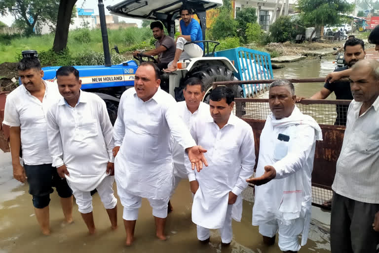 Dirty water on road in Israna