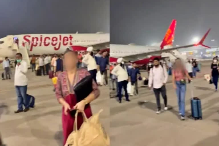 SpiceJet Passengers walk on Delhi Airport tarmac after waiting 45 minutes for bus