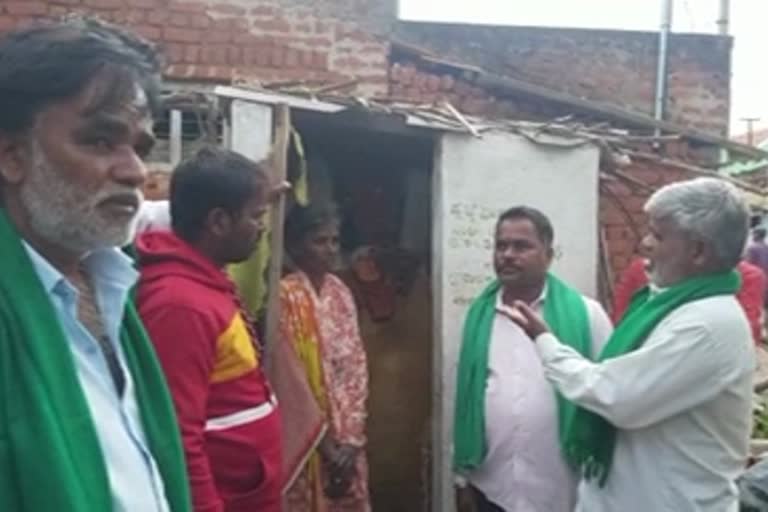 a-woman-living-in-the-toilet-after-her-house-collapsed-due-to-rain