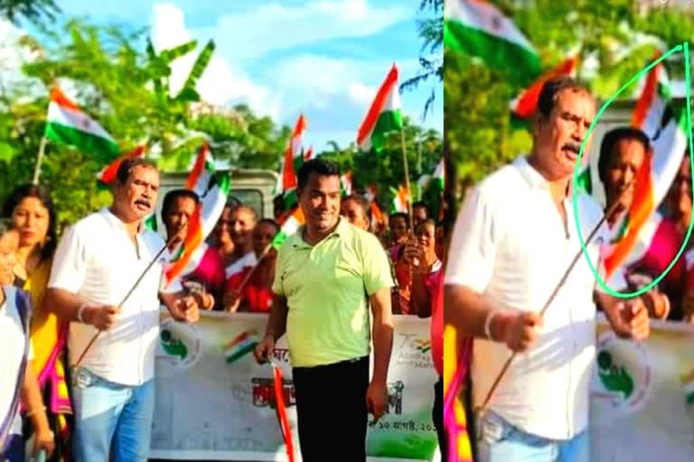 MLA Shibu Mishra in controversy holding  national flag in reverse