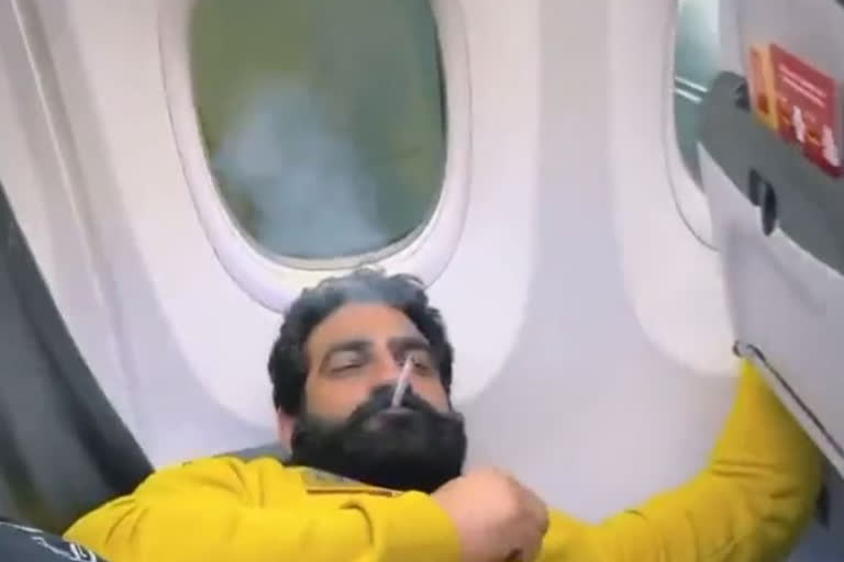Bobby Kataria, social media influencer drinks on middle of the street, smokes on air-plane