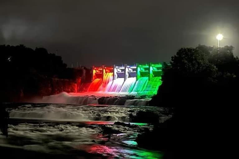 swirling tricolor water flows from barvi dam which supplies water to thane district for independence day
