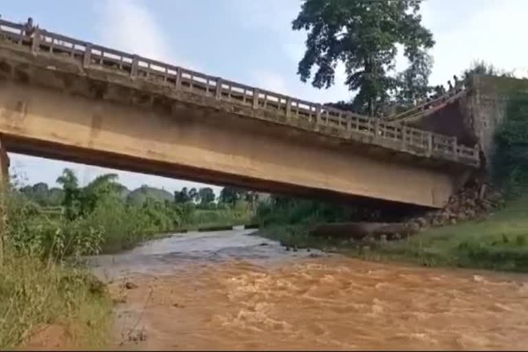 bridge collapsed after heavy rain in koraput