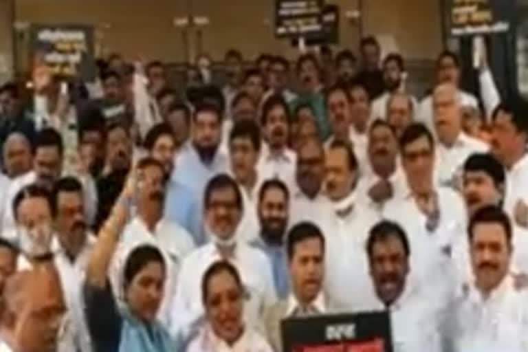 Opposition shouted slogans outside the assembly
