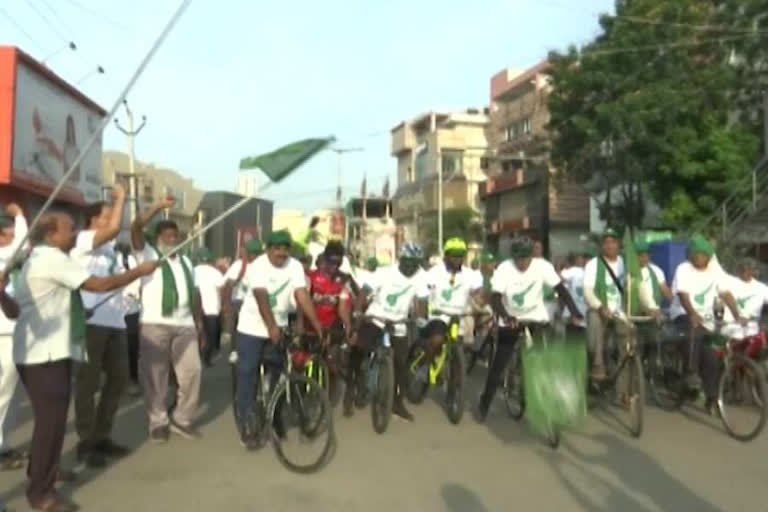 Farmers of Amaravati cycle with the slogan of Save Andhra Pradesh