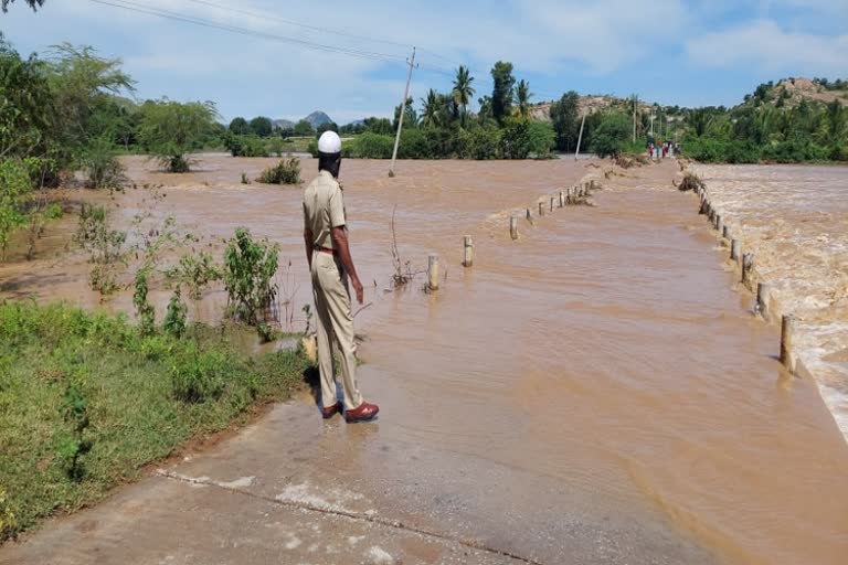 man-and-mahindra-pick-up-washed-away-in-tumakuru