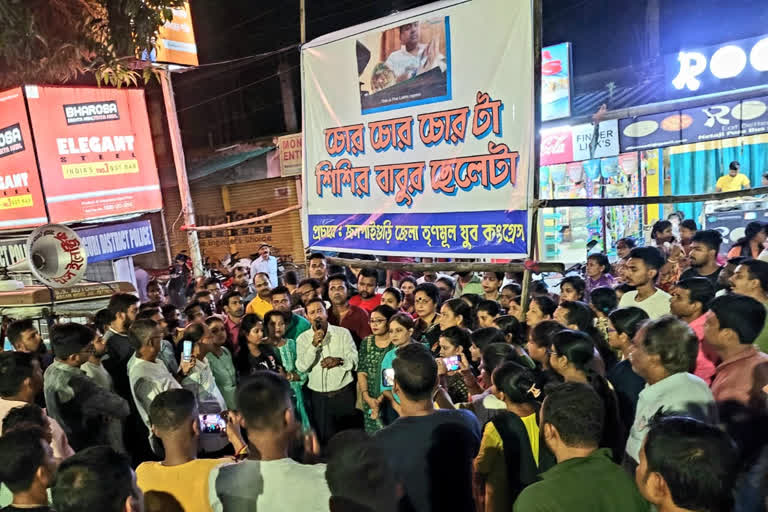 Trinamool Congress puts up banner in Jalpaiguri with picture of Suvendu Adhikari accepting cash