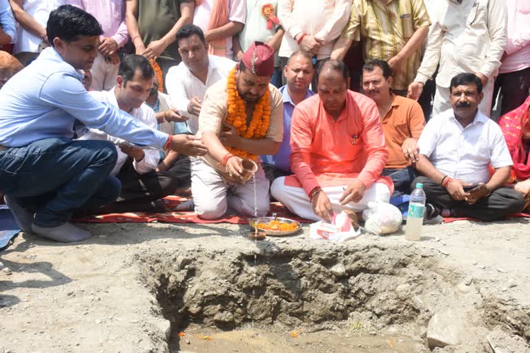 Bus stand parking construction started behind geogrid wall