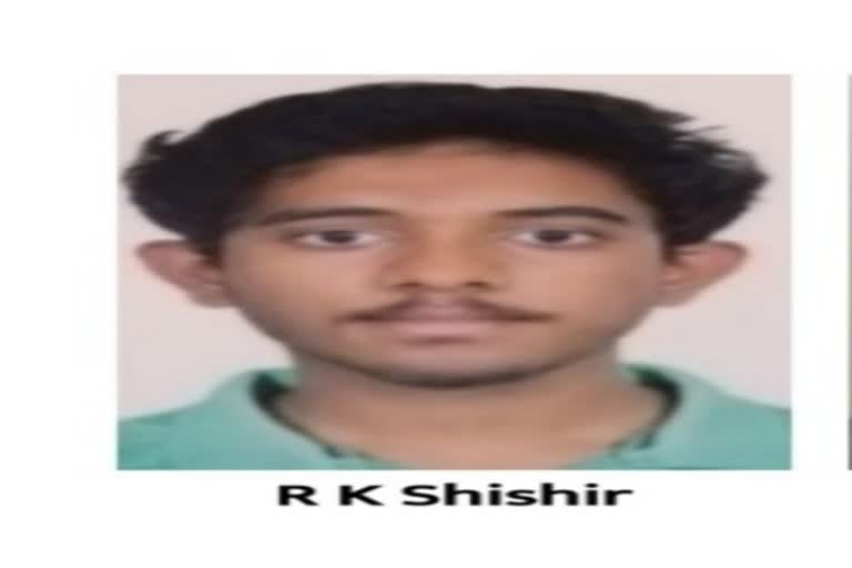 R K Shishir rank first