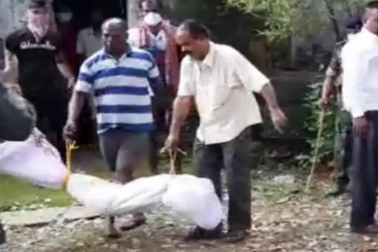 dead body taken out from grave