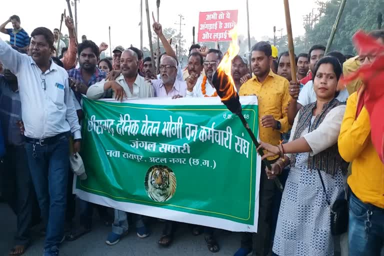Daily wage workers union took out torch rally