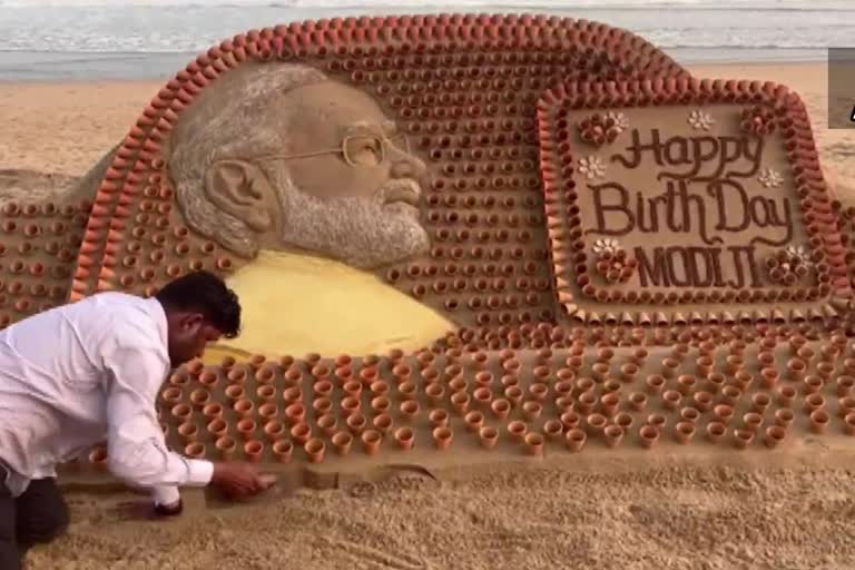 Sand artist Sudarsan Pattnaik made a sand sculpture wishing PM Modi on his birthday