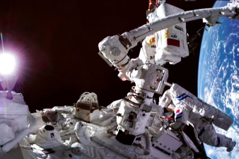 Chinese astronauts go on spacewalk from new station