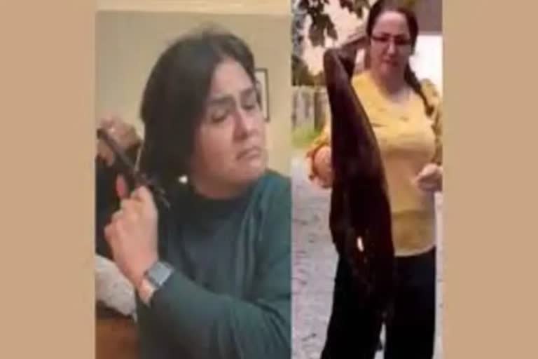 Iranian women chop off hair, burn hijabs to mark protest over Mahsa Amini Death