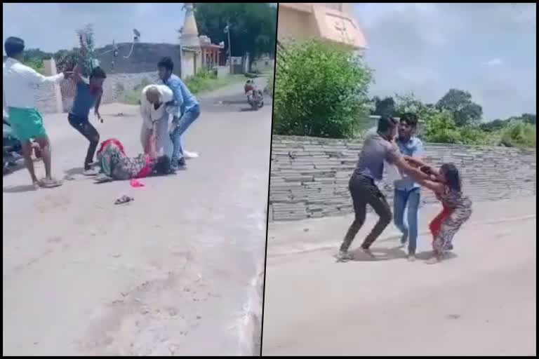Assault on woman in middle road at Vijaypur