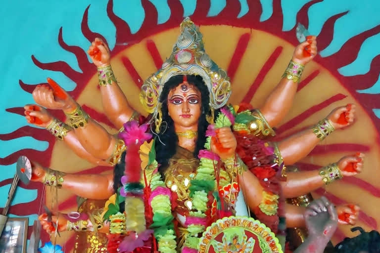West Bengal: Men and women reenact the battle between goddess Durga and Ashura