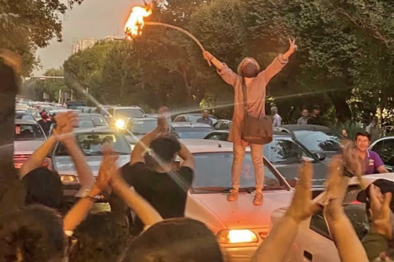 At least 9 killed as Iran protests spread over woman's death