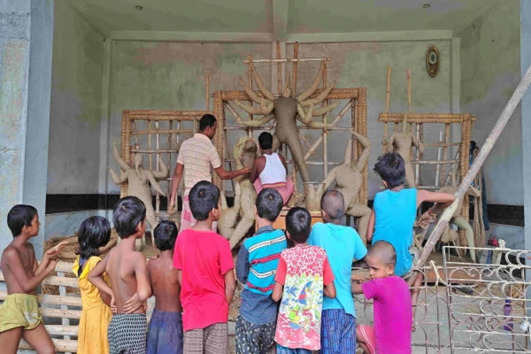 Mother nature vs Goddess Durga: The mobile Durga Puja of Bengal