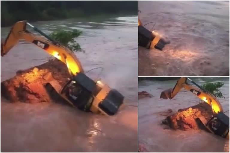 Bulldozer falls into canal while demolishing old bridge in Muzaffarnagar  Bulldozer falls into canal in Muzaffarnagar  പാലം പൊളിക്കുന്നതിനിടെ ബുള്‍ഡോസര്‍ കനാലില്‍ വീണു  ഗംഗ കനാല്‍  ലഖ്‌നൗ  ലഖ്‌നൗ വാര്‍ത്തകള്‍  lucknow bridge  ബുള്‍ഡോസര്‍  Natioanl news  National news updates