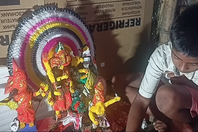 two brother making goddess idols in Jorhat