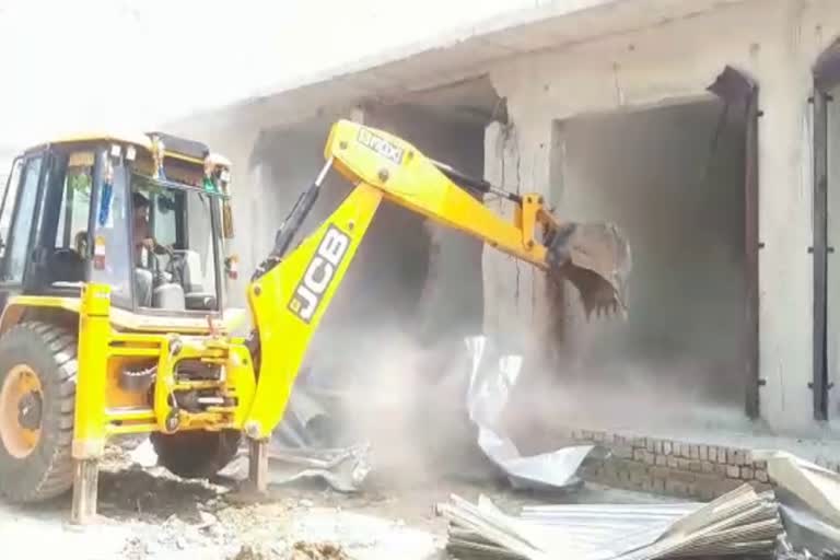 Bulldozer action on trust land in Rewari