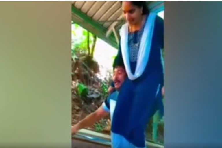 wife being carried on shoulder of husband