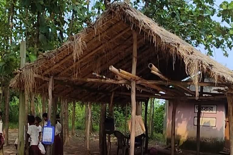 Children study in hut at Kendposhi Primary School in Ghatshila