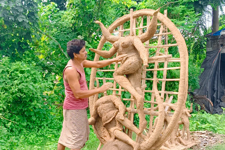 specially abled Bikash Bishal making idols since 30 years in Jhargram