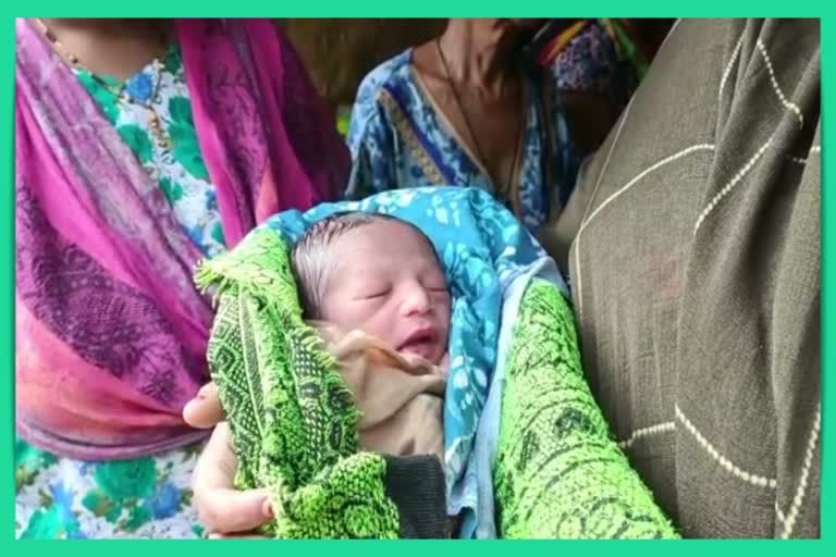 Newborn Baby in Garbage Dump