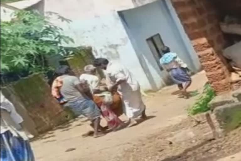 People who grabbed the old woman dragged