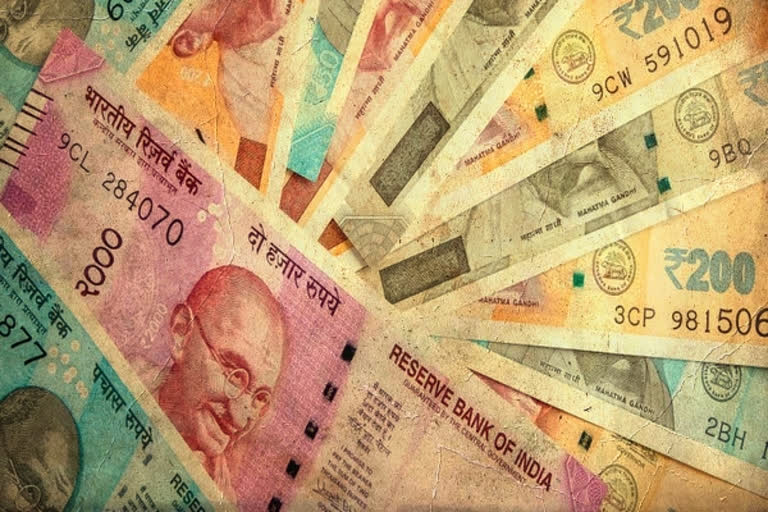 Rupee raises against US dollar