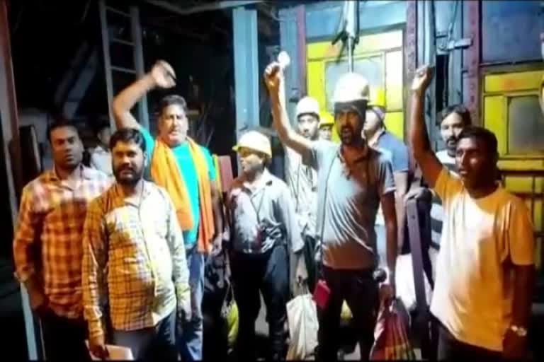 Workers protest inside underground mine in Dhanbad