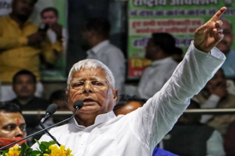 RJD demands Lalu photo on Indian currency