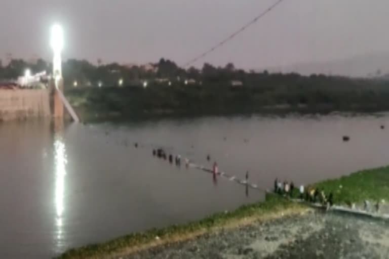 Morbi suspension bridge collapsed  morbi suspension bridge lacked fitness certificate  suspension bridge on Machchhu river in Gujarat  132 people killed in morbi bridge collapse  bridge in Morbi Collapsed after repair work  suspension bridge in Morbi  മോര്‍ബിയിലെ പാലം  ഫിറ്റ്നസ് സര്‍ട്ടിഫിക്കറ്റ്  മച്ചു നദി  മോര്‍ബി  ഗുജറാത്തി പുതുവത്സര ദിനം  സർ വാഗ്‌ജി താക്കൂർ  മോര്‍ബിയിലെ പാലം തകര്‍ന്നു