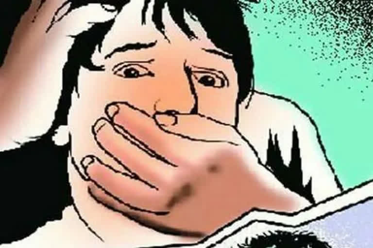 Man held for digital rape