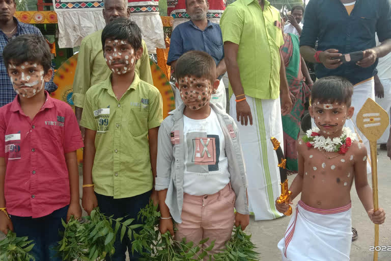 Devotees who gave black dots to children with strange elegance near  perambalur