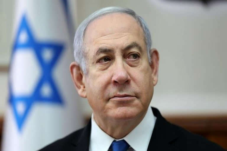Exit polls predict narrow win for former Israeli PM