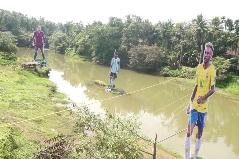 Cristiano Ronaldo  Kozhikkode  Messi and Neymar  huge cutout of Cristiano Ronaldo  fans  കാല്‍പന്തുകളി  ക്രിസ്‌റ്റ്യാനോ  ക്രിസ്‌റ്റ്യാനോയുടെ പടുകൂറ്റന്‍ കട്ടൗട്ട്  ആരാധകര്‍  മെസ്സി  ക്രിസ്‌റ്റ്യാനോ റൊണാള്‍ഡോ  റൊണാള്‍ഡോ  ബ്രസീല്‍  അര്‍ജന്‍റീന  കോഴിക്കോട്  പോര്‍ച്ചുഗല്‍  പുള്ളാവൂരില്‍  പുള്ളാവൂർ പുഴ